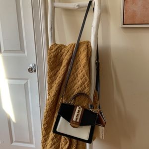 BRAND NEW White, black, and brown leather crossbody bag with matching wallet.